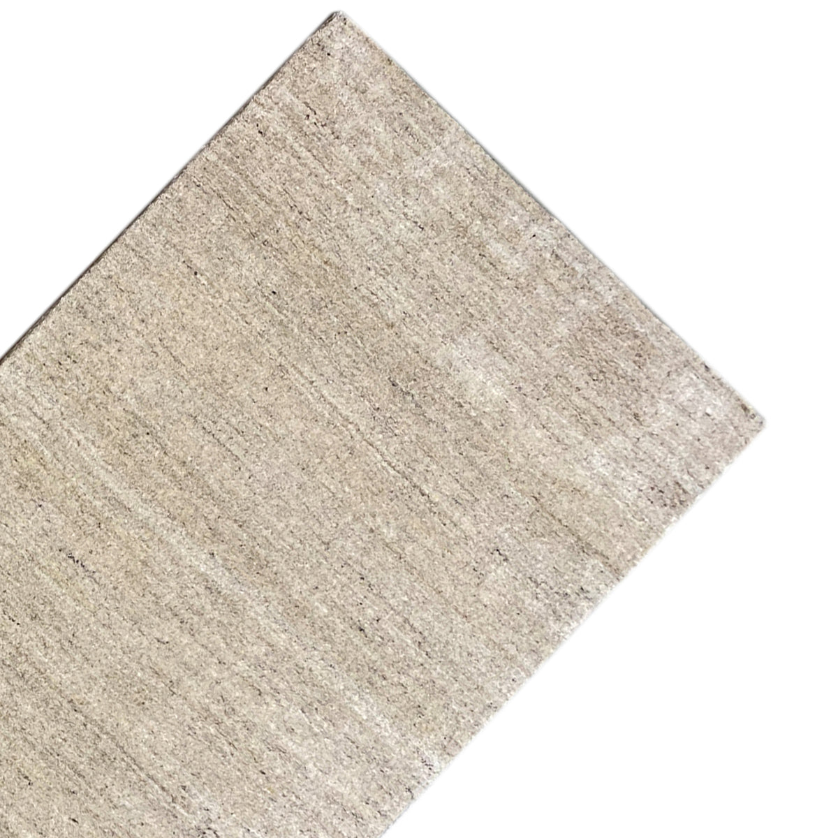 Beige carpet viewed from the corner, with a uniform texture and subtle stripes