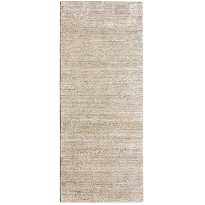 Beige rectangular rug with a fine, irregular texture and subtle grain pattern