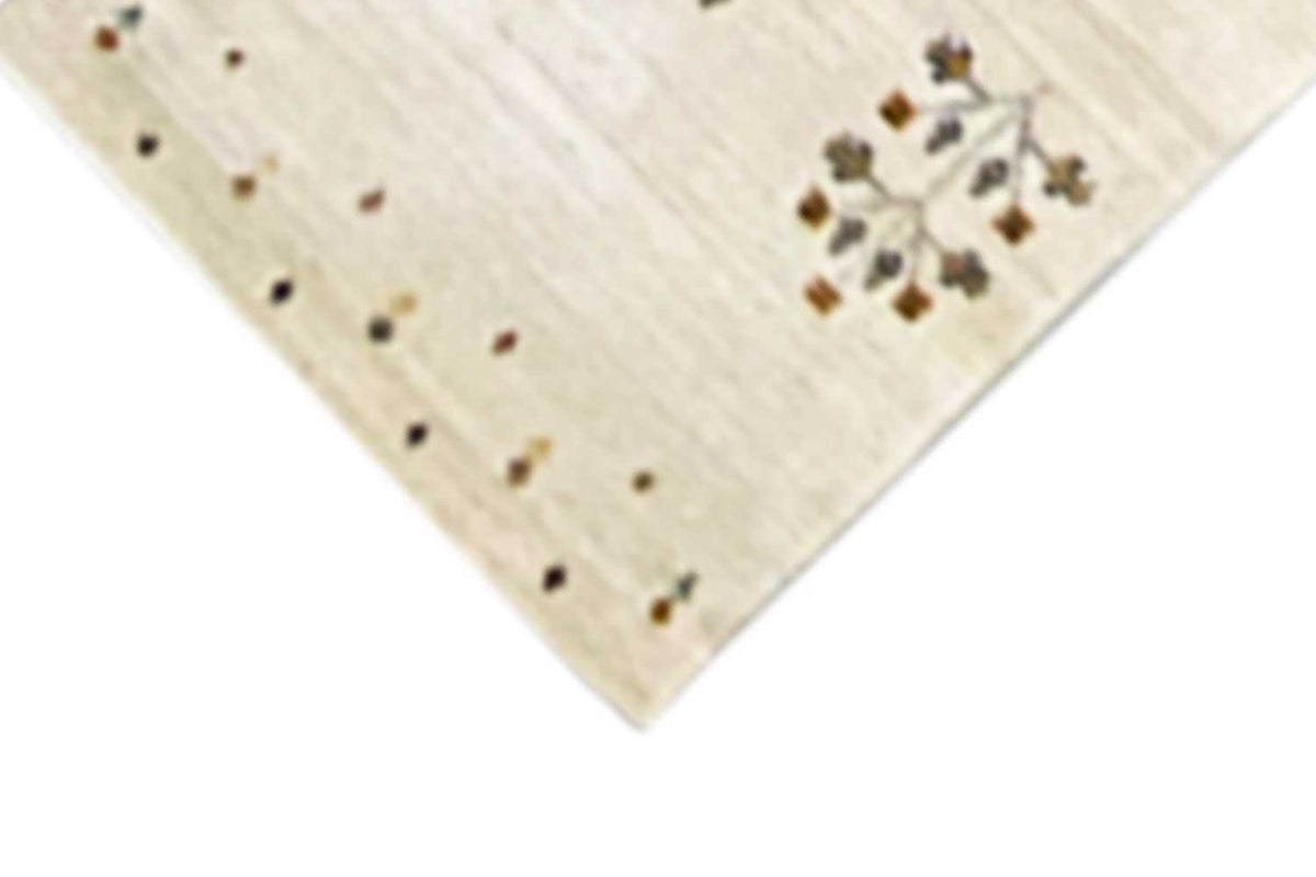 Gabbeh runner corner, cream-colored fabric with dotted ornaments and fringes