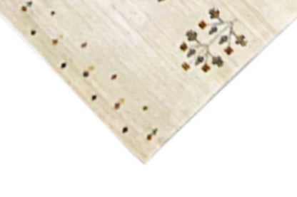 Gabbeh runner corner, cream-colored fabric with dotted ornaments and fringes