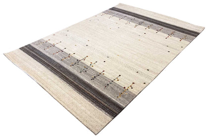 Beige Gabbeh rug with a wide dark stripe and dot and thread ornaments