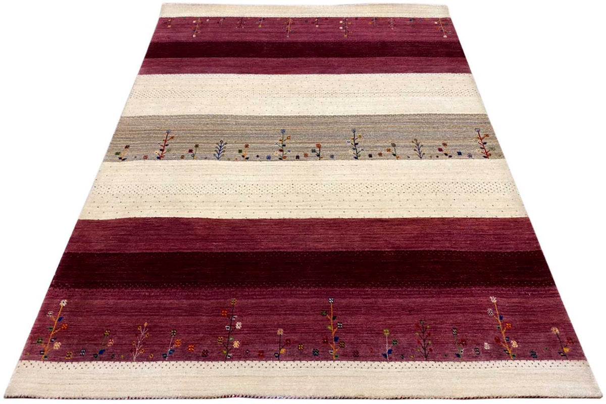 Gabbeh rug: cream-colored bands, burgundy stripes, and small rows of patterns