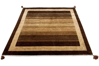 Gabbeh rug with elongated brown and beige stripes, wide light border, fringes.