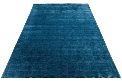 Blue Gabbeh rug, laid flat with clear edges, viewed from below