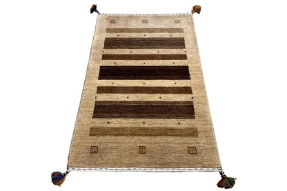 Gabbeh rug 121x72 cm, rolled out at an angle, beige look with brown stripes