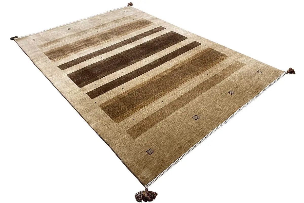 Gabbeh rug in diagonal view: high-contrast stripes, fringes at all four corners