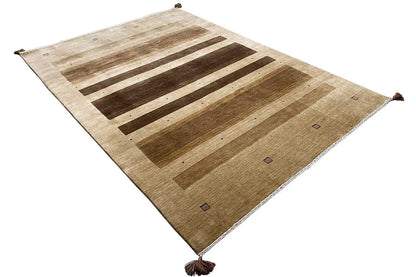 Gabbeh rug in diagonal view: high-contrast stripes, fringes at all four corners