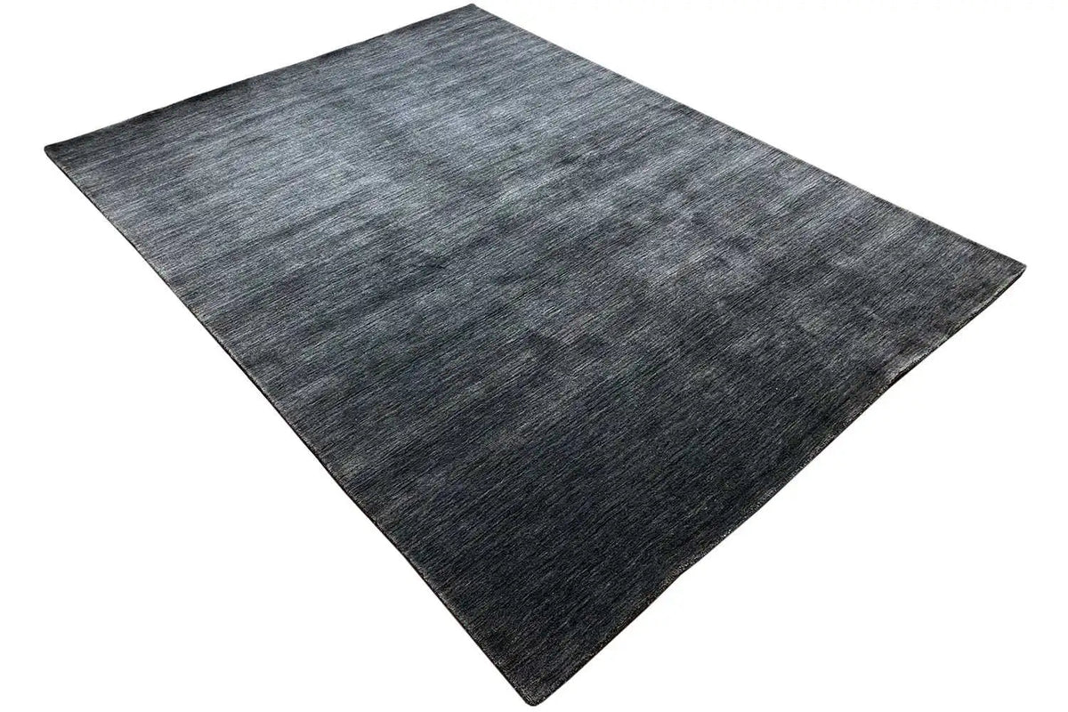 Square dark blue-gray rug with a marled texture