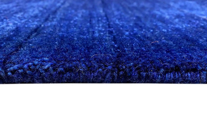 Gabbeh rug made of woven fabric, 176x123 cm, close-up: dark blue pile texture