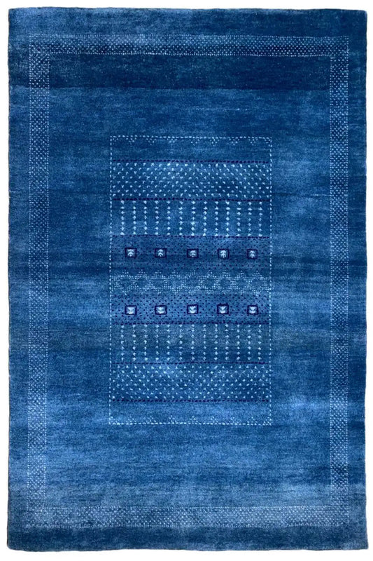 Lori Gabbeh rug 90x121 cm in blue with a geometric pattern