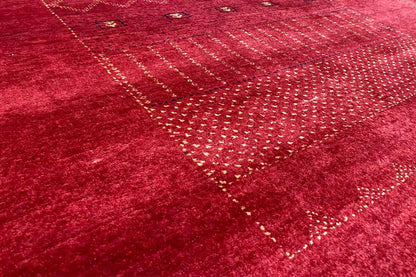 Lori Gabbeh rug: red all-over pattern with dot, line, and zigzag ornaments
