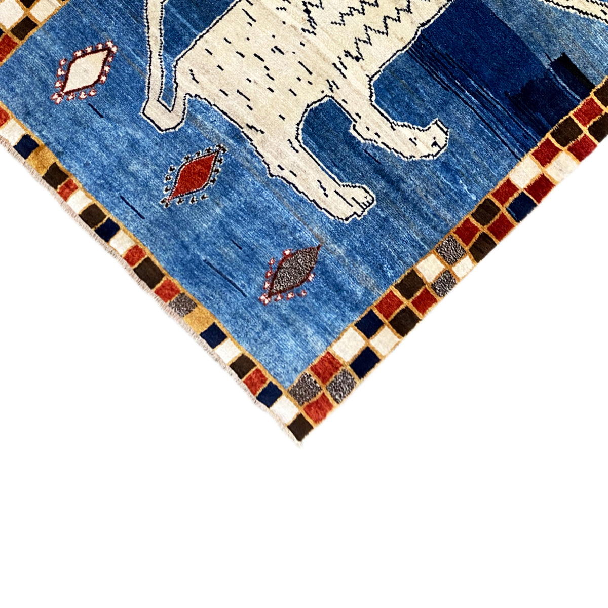 Gabbeh rug with lion motif and colorful diamonds, checkered border finish.