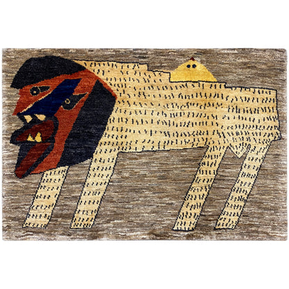 Gabbeh rug with a stylized lion motif in brown, beige, yellow, blue, and red