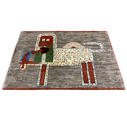 Lion Gabbeh rug 117x79 cm, gray field with an appliqué animal motif and red trim
