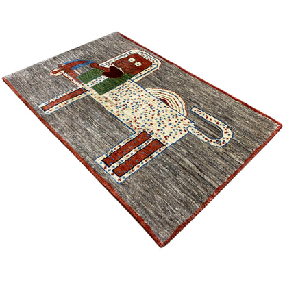 Lion gabbeh rug 117x79 cm, animal appliqué on a gray woven ground with a red edge border