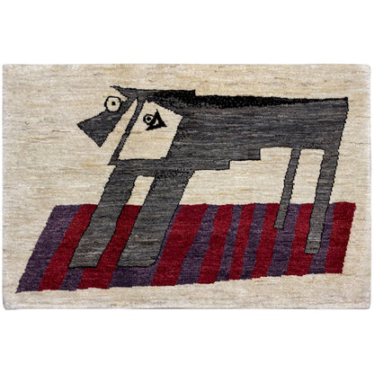Beige Gabbeh rug with a graphic pattern in black, red, and gray