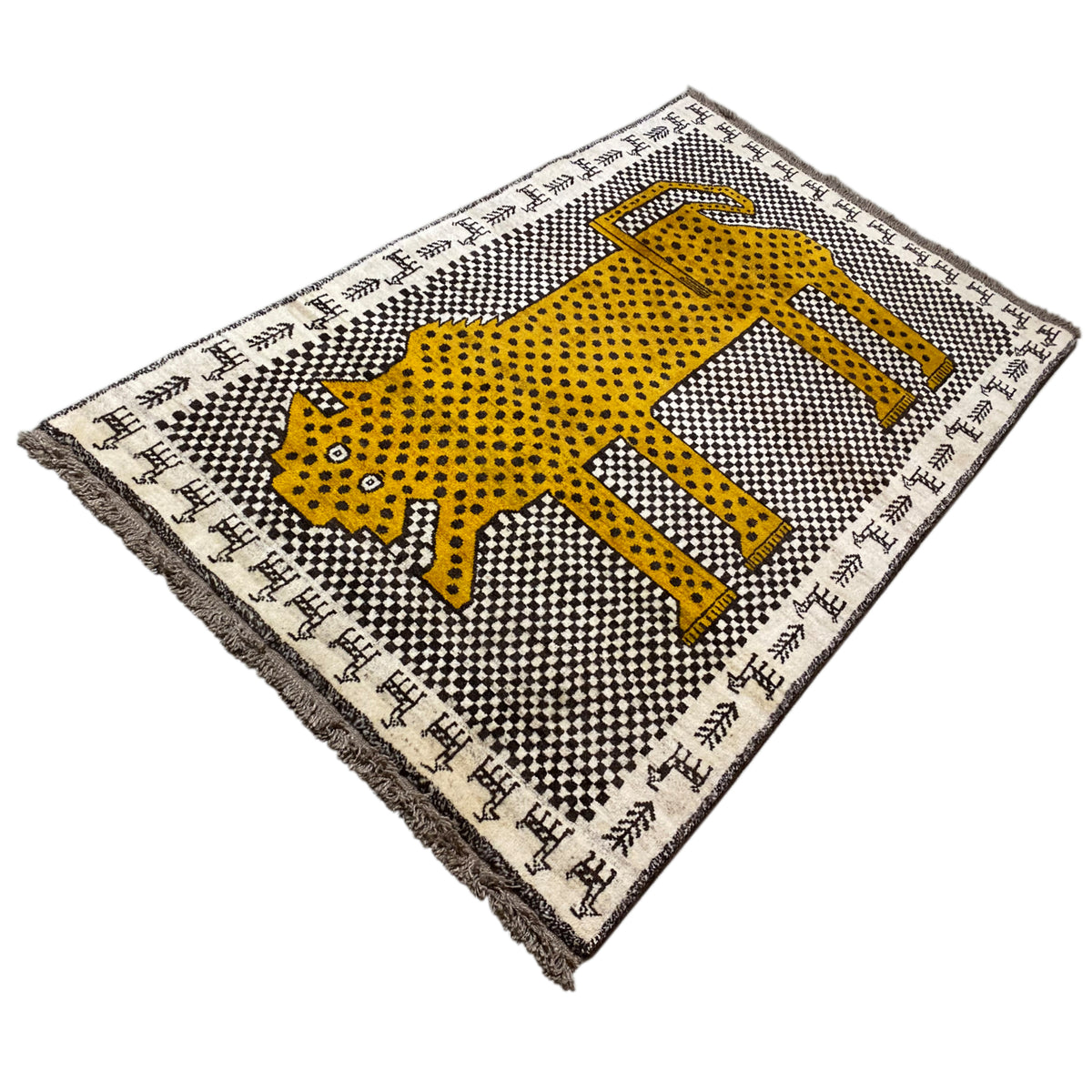 Gabbeh rug with a yellow leopard figure on a checkered pattern, border, fringes