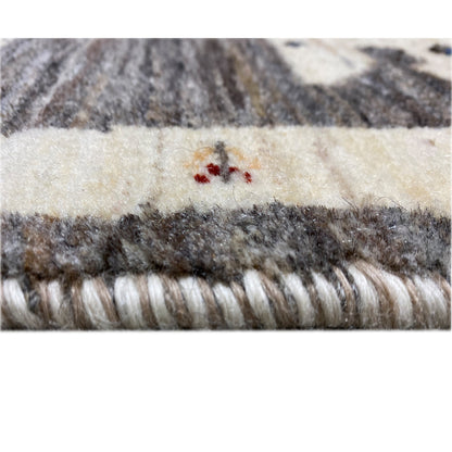 Gabbeh rug 89x60 cm close-up of edge fringe, dark gray and cream with small embroideries