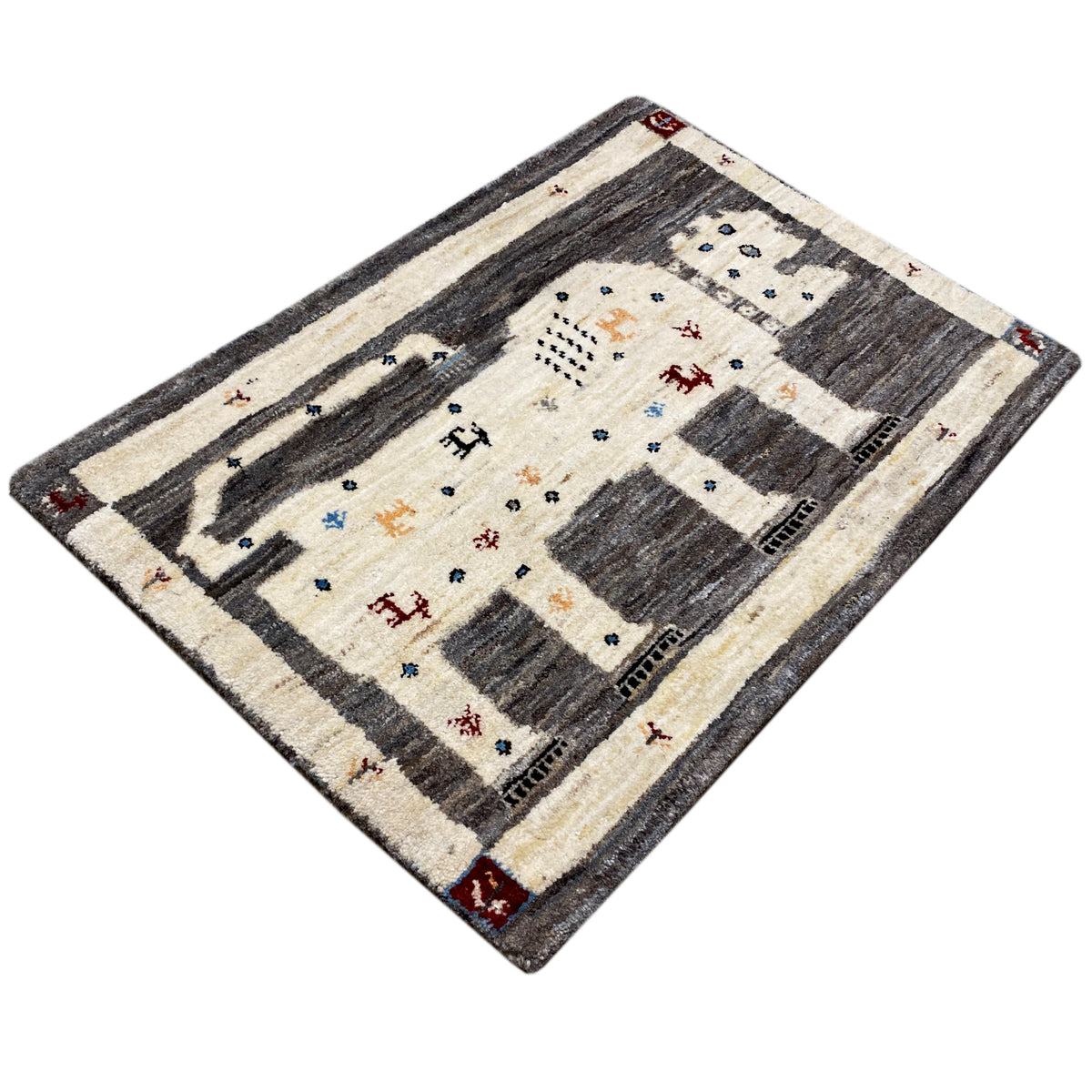 Gabbeh rug with lion motif, diagonal view, cream with dark gray areas