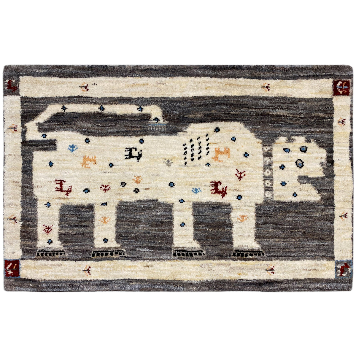 Gabbeh rug with lion motif: cream, dark gray, colorful accents