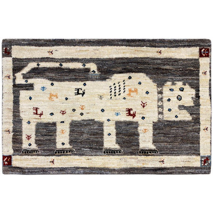 Gabbeh rug with lion motif: cream, dark gray, colorful accents