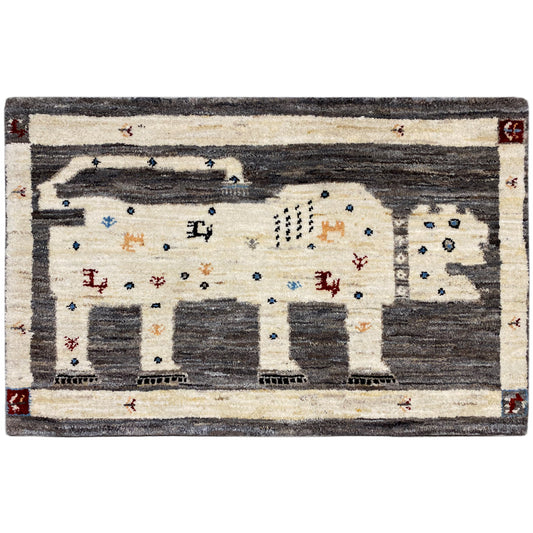 Gabbeh rug with lion motif: cream, dark gray, colorful accents