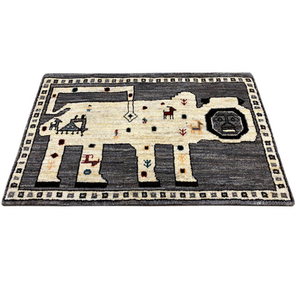 Gabbeh rug in gray and ecru with decorative symbols and a wide border