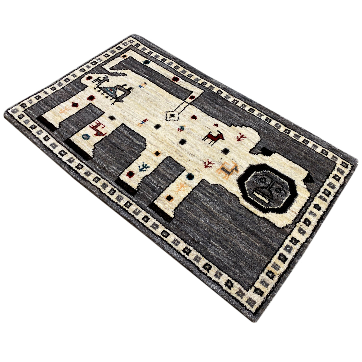 Gabbeh rug in gray/ecru with a geometric pattern and ornate border trim