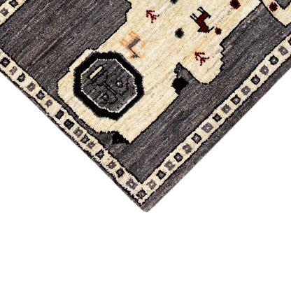 Gabbeh rug with a corner motif and border, cream-colored center between gray areas