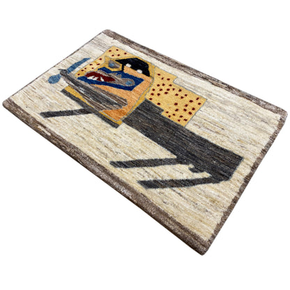 Beige carpet in detail: image motif, yellow accents and black horizontal stripes