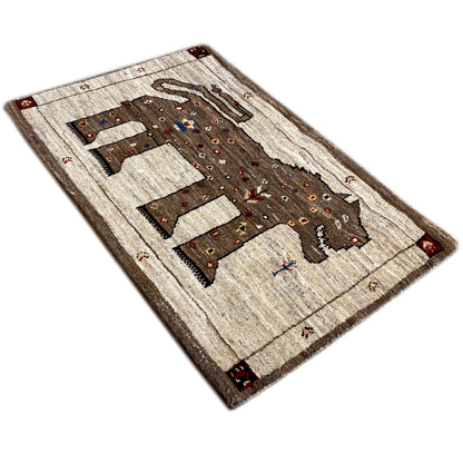 Brown Gabbeh rug with lion motif, diagonal view, bound edges