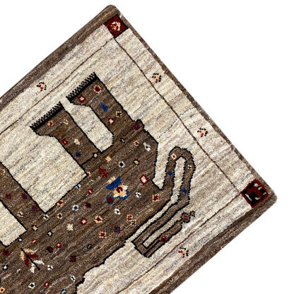 Brown Gabbeh rug with lion motif, angled view of the border