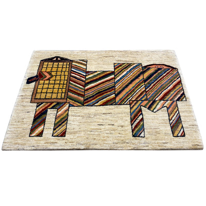 Beige rug with a colorful animal motif and stripes, flat-lying