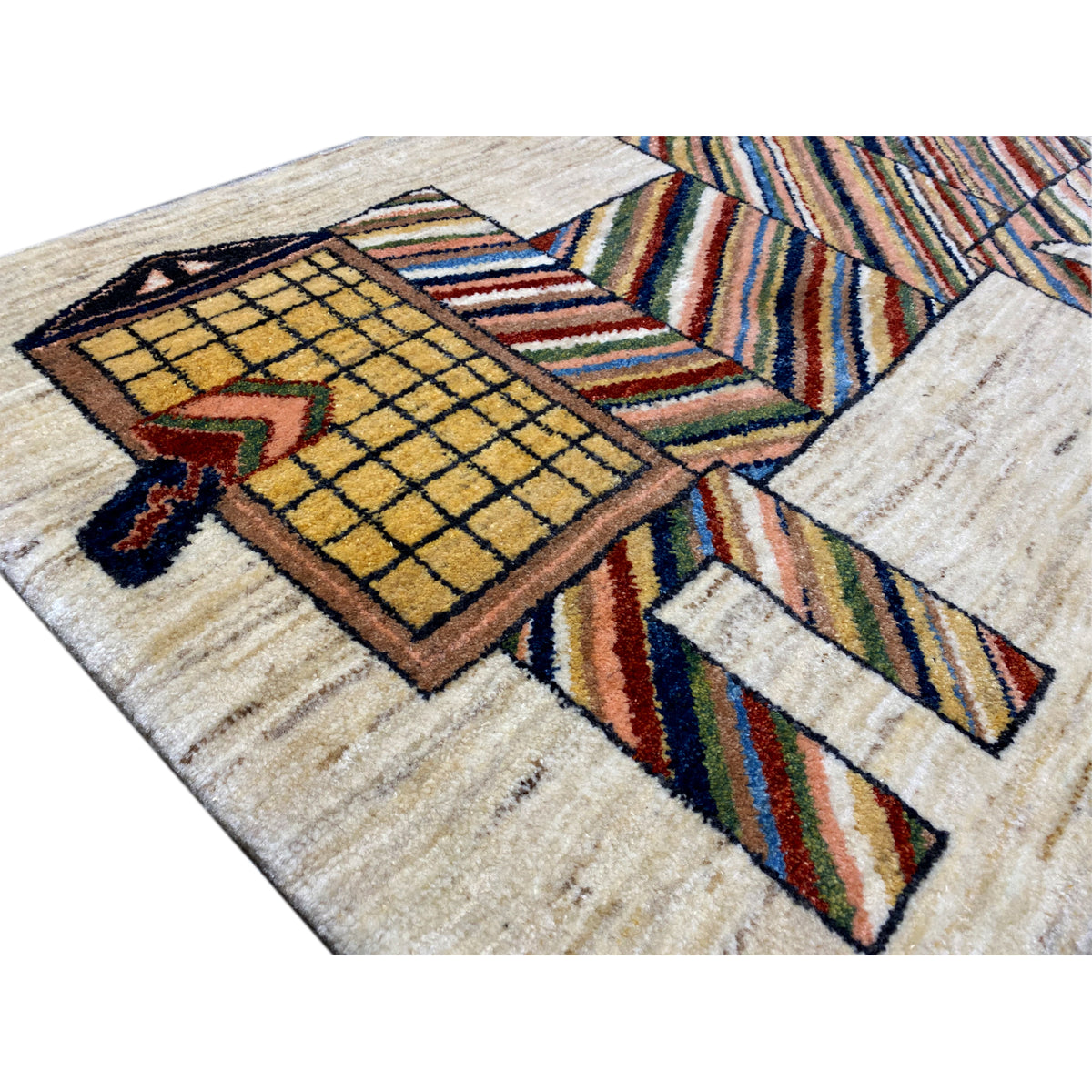 Beige carpet close-up: yellow grid square with colorful stripes