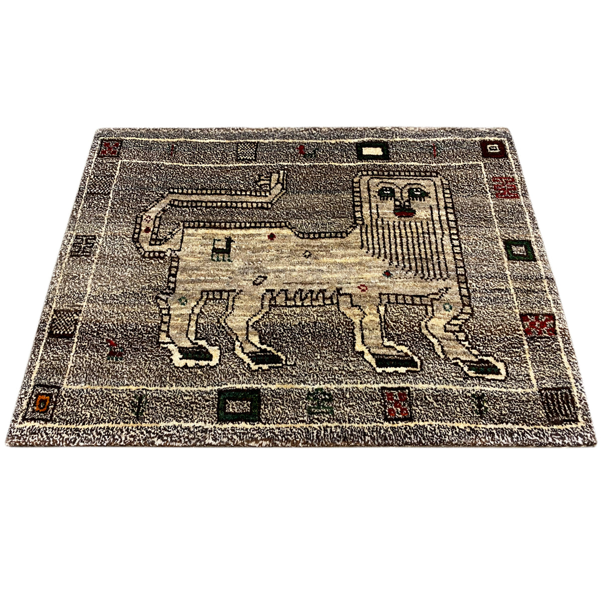 Gray rectangular rug with a detailed geometric relief pattern in black and white