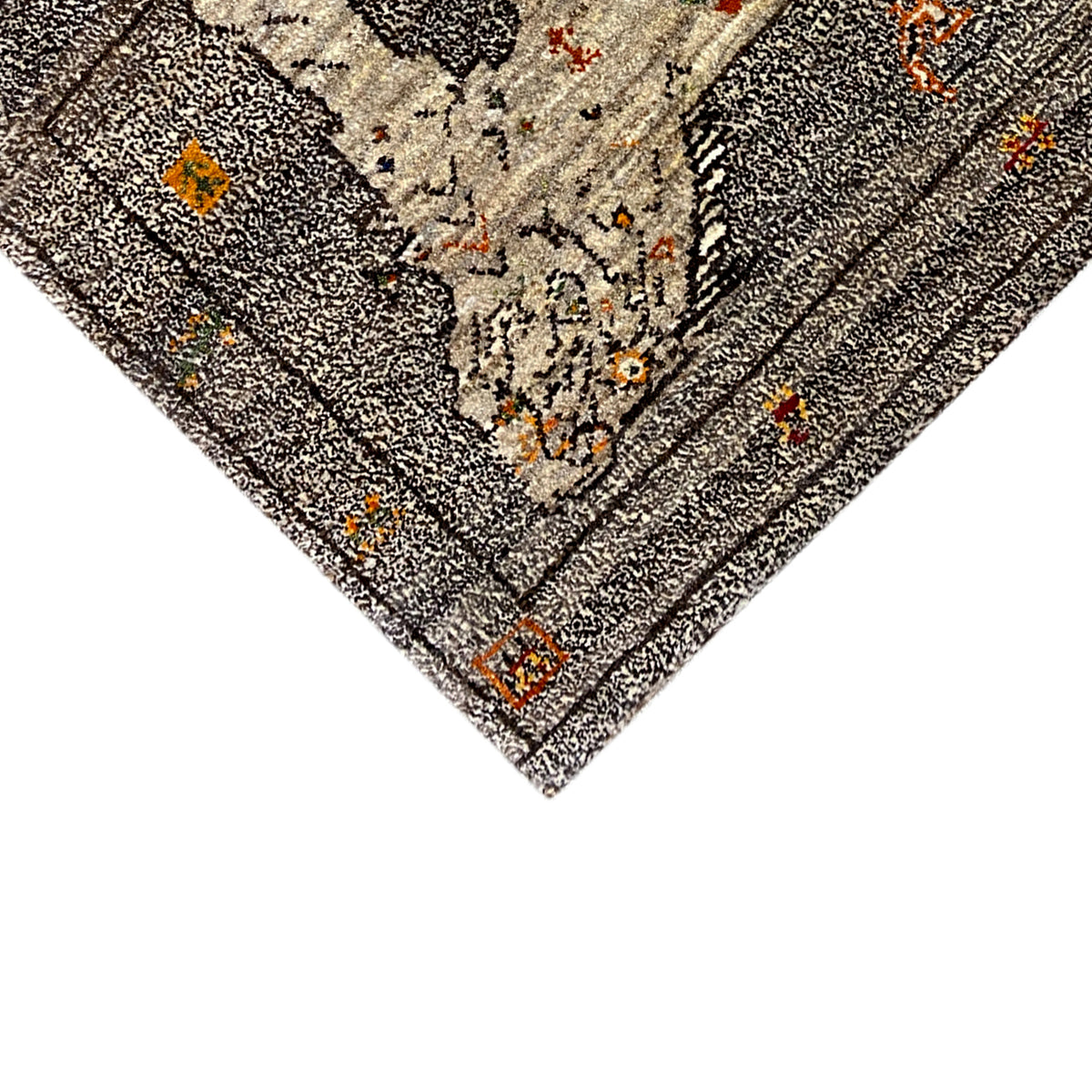 Corner detail with border: dark pile and beige motif, gray-beige, Gabbeh rug