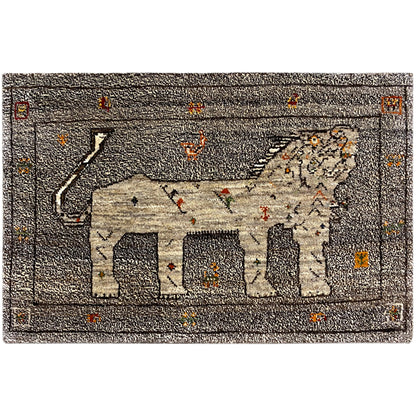 Rectangular Gabbeh rug with an elephant motif in beige on a dark background, 96x65 cm
