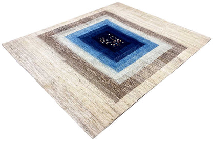 Oriental rug with a blue central border, cream and brown, symmetrical medallion