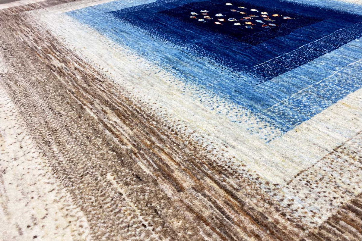 Close-up of the carpet pattern: cream, brown stripes, and a blue center with dark dots