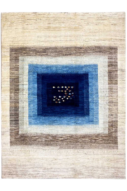 Oriental rug with a square pattern in cream, brown, and dark blue with black accents