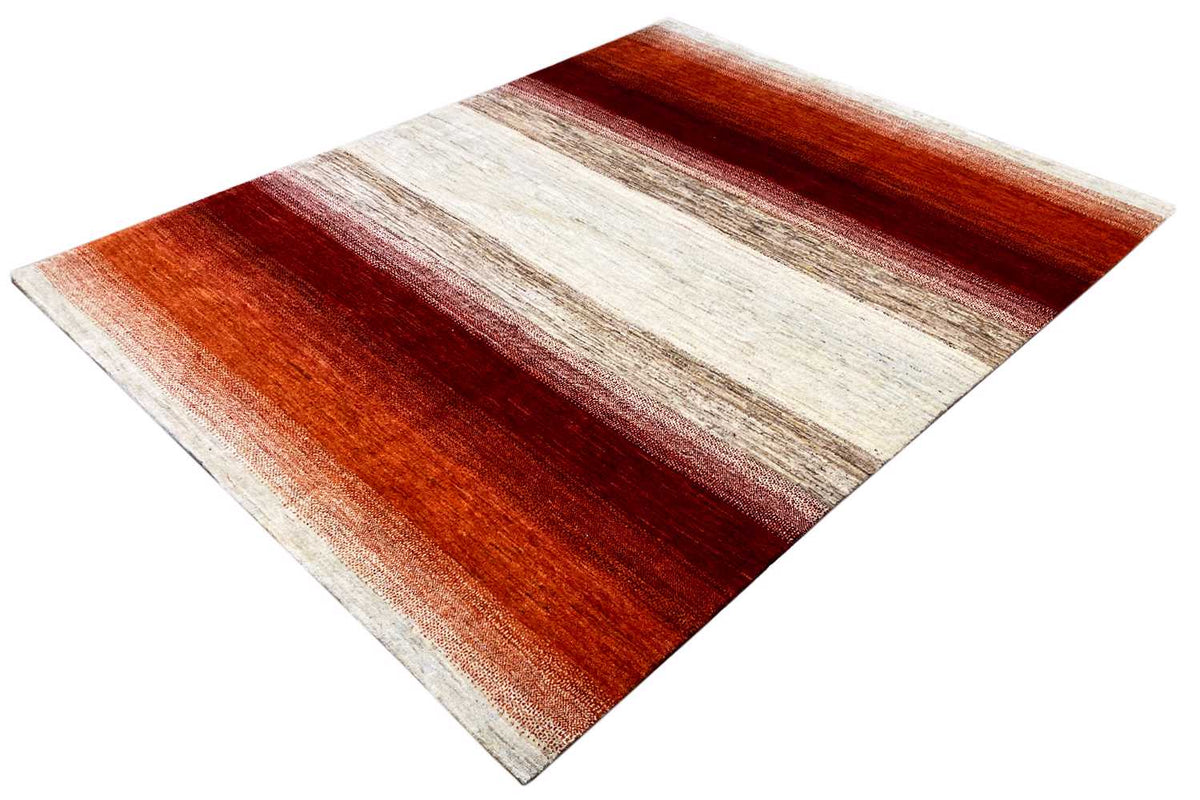Rug corner with a diagonal pattern in reddish brown and cream