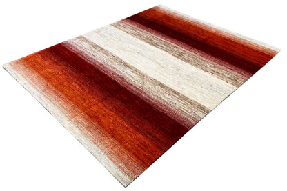 Rug corner with a diagonal pattern in reddish brown and cream