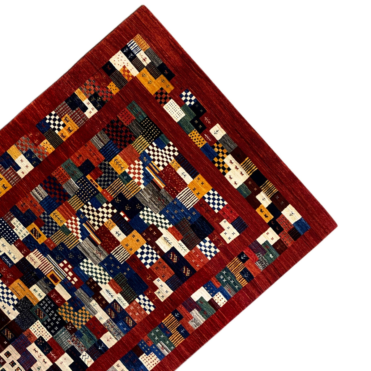 Gabbeh-Luri rug 300x194 cm corner view: patchwork block pattern with a dark border