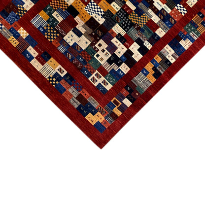 Gabbeh-Luri rug 300x194 cm edge detail, square motifs in blue, red, beige, and green