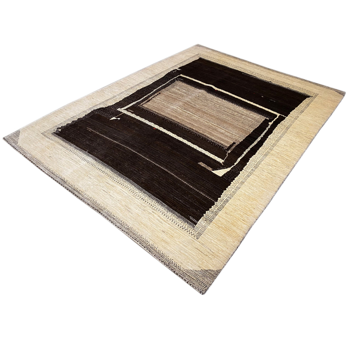 Abstract rug with a light outer border and a dark inner design of nested rectangles