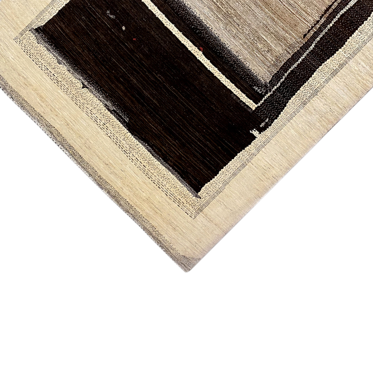 Abstract carpet detail with a dark central area, light decorative stripes, and a beige border