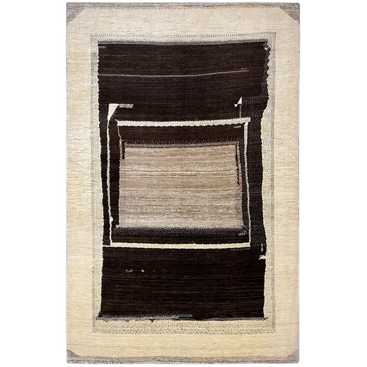 Abstract Gabbeh-Luri rug with a wide light border and a dark square pattern in the center