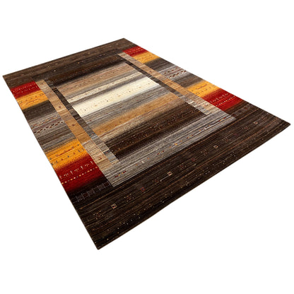Gabbeh-Luri rug photographed at an angle, brown with beige and orange-red border stripes