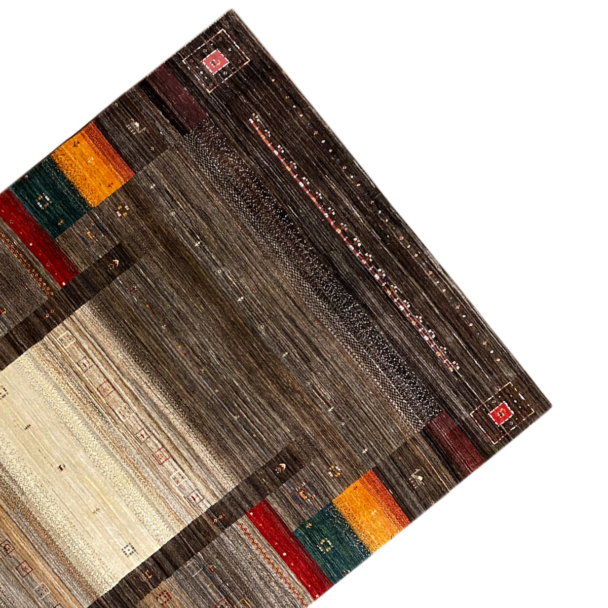 Gabbeh Luri rug viewed from above at an angle: brown pattern with beige areas and colorful stripes