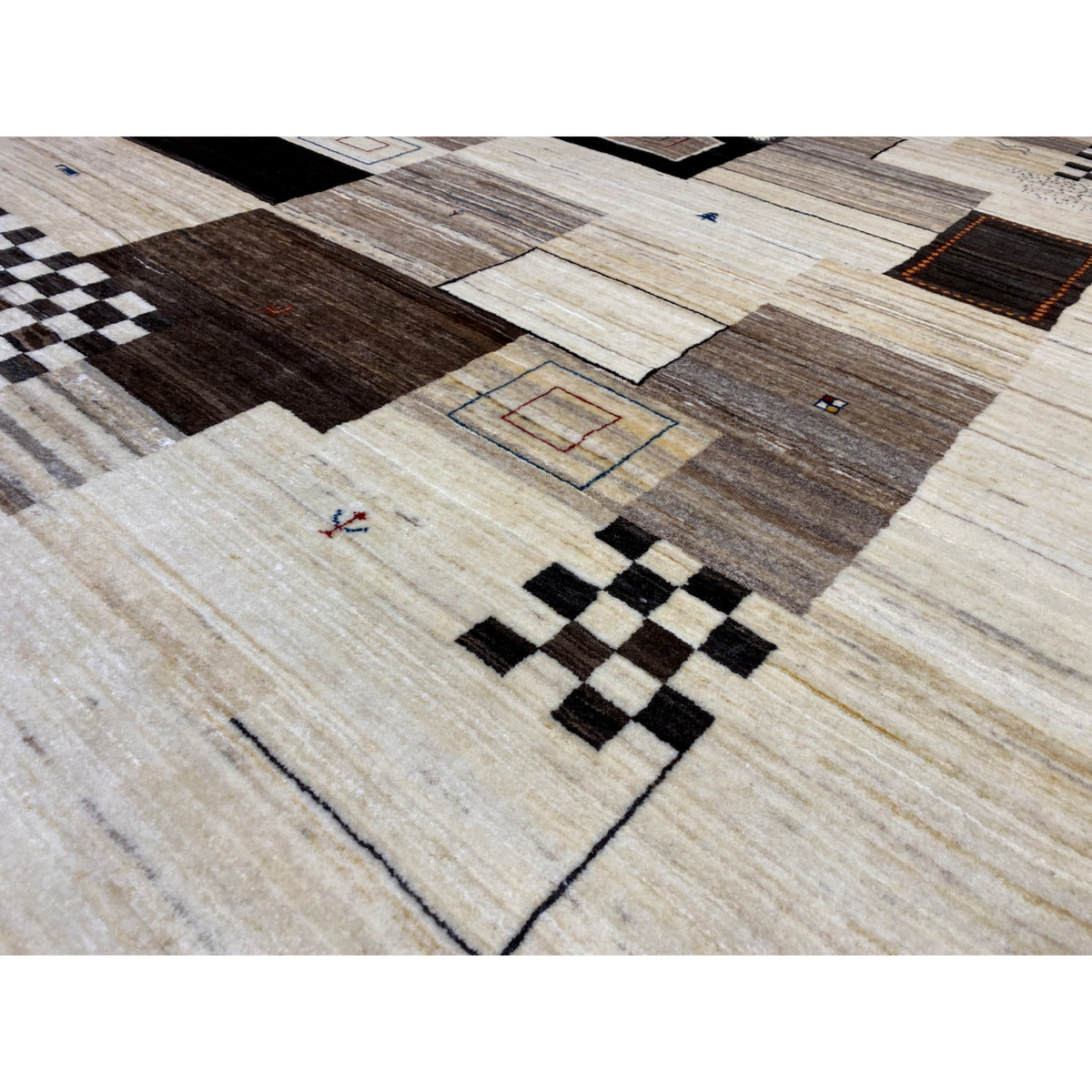 Close-up: beige carpet with black patterns and gray-brown block stripes